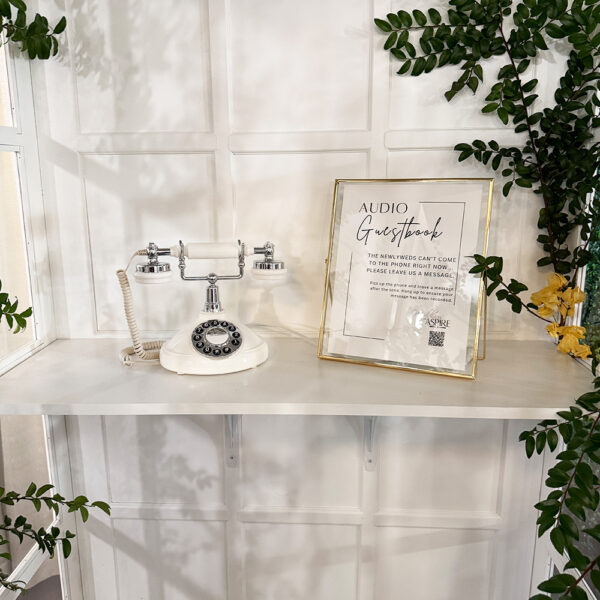 Vintage-style audio guest book rental for weddings, featuring a retro design and user-friendly setup, perfect for capturing heartfelt messages from guests as timeless keepsakes.